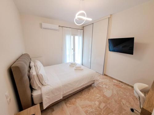Ένα ή περισσότερα κρεβάτια σε δωμάτιο στο Luxury Suite Patras (2)