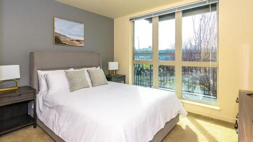 Postel nebo postele na pokoji v ubytování Landing - Modern Apartment with Amazing Amenities (ID8687X92)