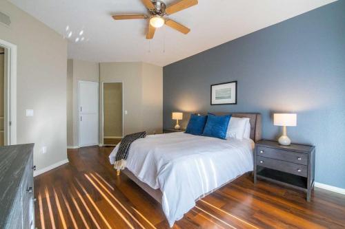 a bedroom with a bed and a ceiling fan at Landing - Modern Apartment with Amazing Amenities (ID1793X49) in Phoenix