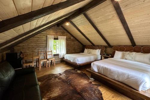 Postel nebo postele na pokoji v ubytování Paradise Village