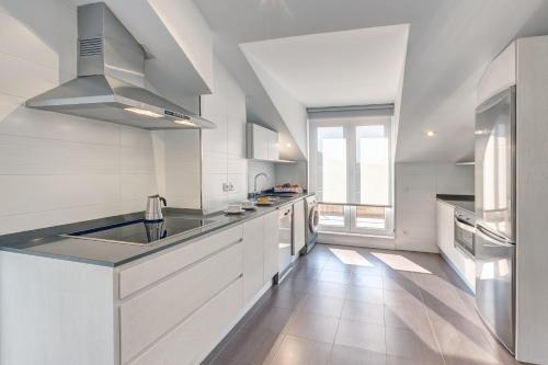 Kuchyň nebo kuchyňský kout v ubytování Apartamentos La Albarca