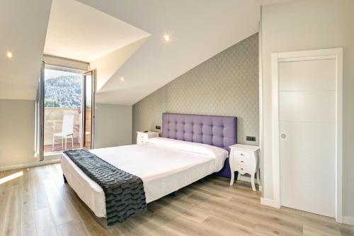 Postel nebo postele na pokoji v ubytování Apartamentos La Albarca
