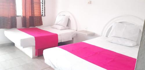 Een bed of bedden in een kamer bij Hotel San Miguel