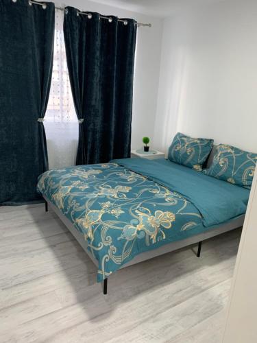 Postel nebo postele na pokoji v ubytování Apartament Elena