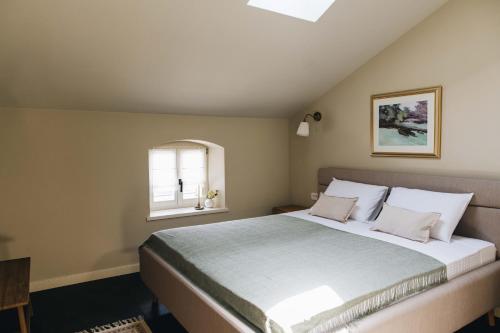 Giường trong phòng chung tại Casa Amalia