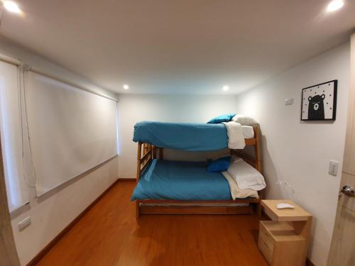 Postel nebo postele na pokoji v ubytování HOMY APARTAMENTOS - Corferias, embassy, airport, G12, UN, Agora