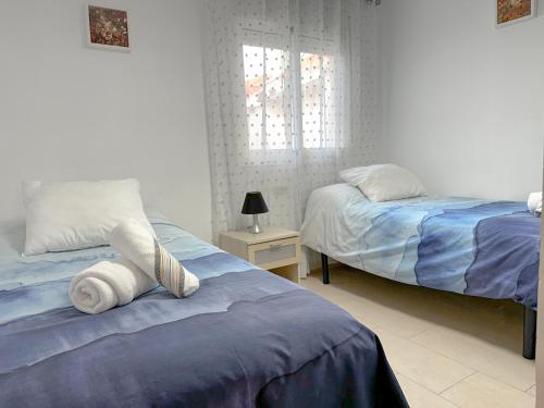 Katil atau katil-katil dalam bilik di Apartamento Mirador del Mediterráneo