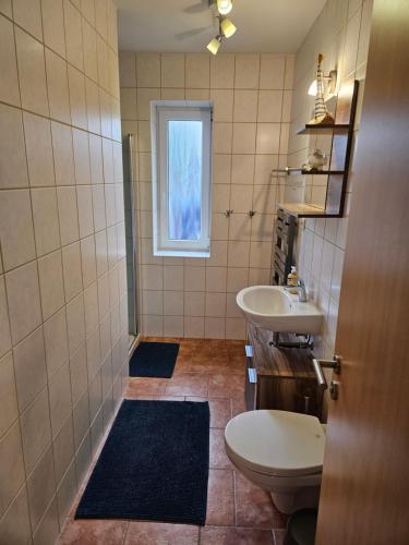 Ένα μπάνιο στο Ferienwohnung Ostsee und Strand