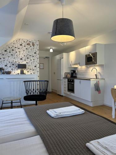 Cuisine ou kitchenette dans l'établissement Halmstad Gårdshotell