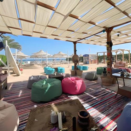 a group of bags sitting on the floor under awning at Sharm Hills Resort in Sharm El Sheikh