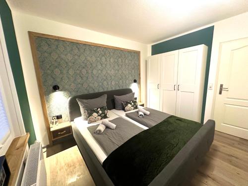 Cama o camas de una habitación en Auszeit Norddeich I 5 Minuten zu Fuß zum Meer
