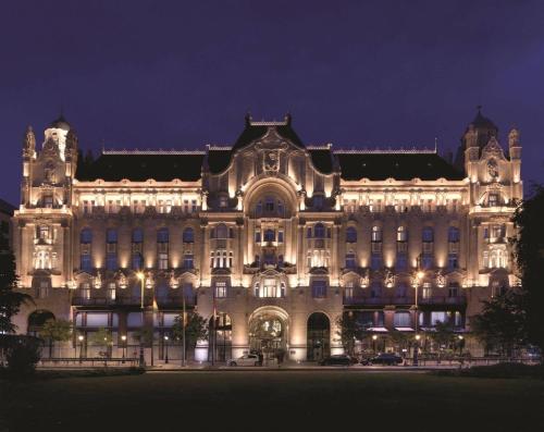 a large building with lights on it at night at BrandNewChainBridgeHome for 2-FastWiFi/AC/SmartTV in Budapest