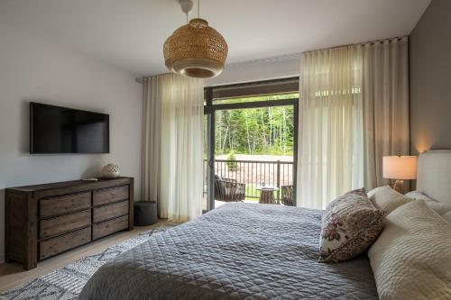 La totale : luxury 3 BR at the mountain tesisinde bir odada yatak veya yataklar