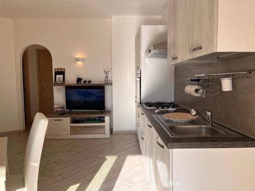 Una cocina o zona de cocina en Residenza Limpiddu
