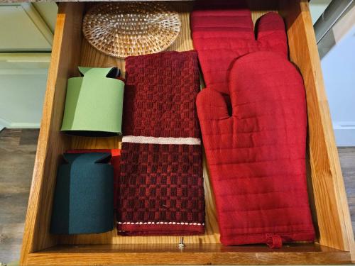 a wooden box filled with different colored ties at Frog Hollow at Hocking Vacations in Logan