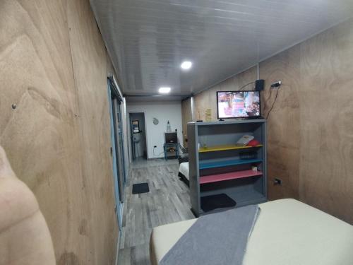 TV a/nebo společenská místnost v ubytování Contihouse en la Montaña