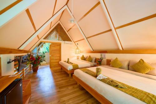Postel nebo postele na pokoji v ubytování Shawandha Lodge