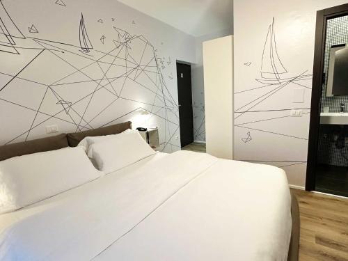 Letto o letti in una camera di SK Active hotel - ex Garni Hotello