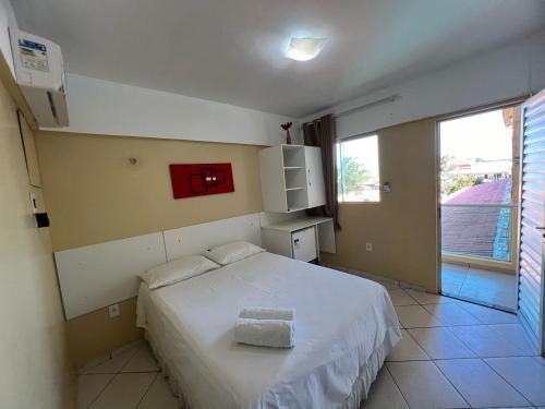 Postel nebo postele na pokoji v ubytování Hotel Concha do Mar