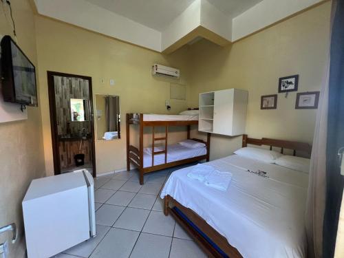 Postel nebo postele na pokoji v ubytování Hotel Concha do Mar