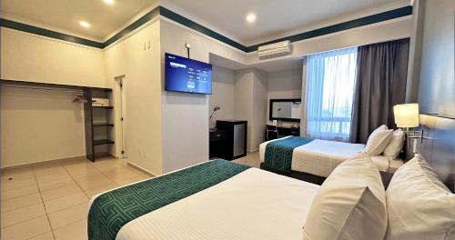 InHouse Hotel Leónにあるベッド
