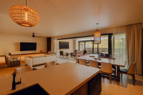 a living room with a couch and a table at Nobu Hotel Los Cabos in Cabo San Lucas