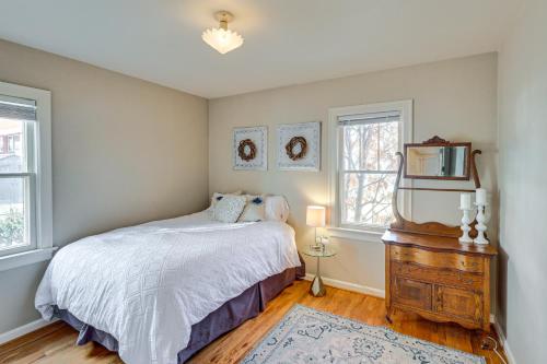 a bedroom with a bed and a mirror and a dresser at Billings Vacation Rental about 1 Mi to Downtown! in Billings