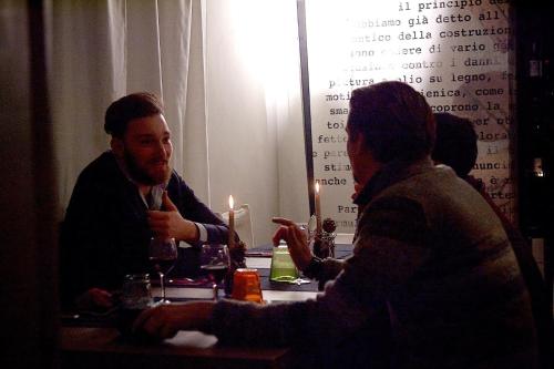 a man and a woman sitting at a table at La Bussola Da Gino in Quarrata
