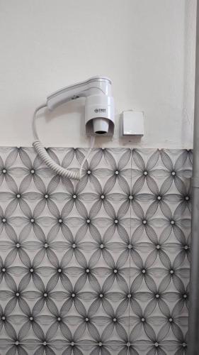 a close up of a light on a wall at Nara Apartment in Valjevo