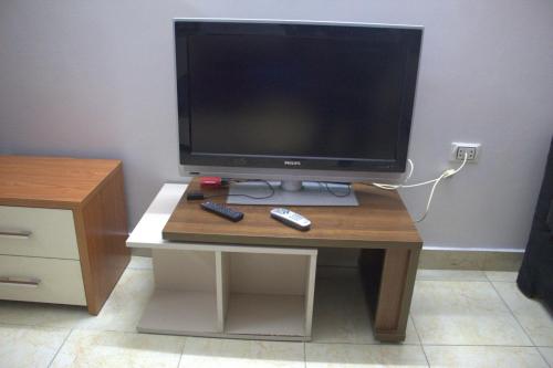 TV a/nebo společenská místnost v ubytování Abeer Guest House