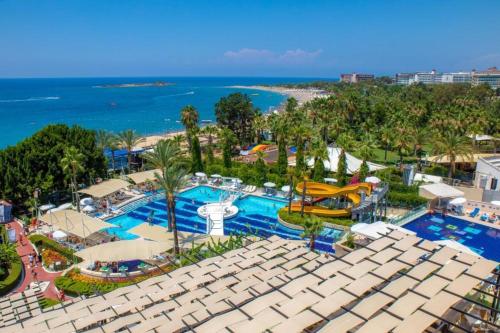 an aerial view of the pool at a resort at Sealife Buket Resort & Spa Hôtel 5 étoiles in Antalya