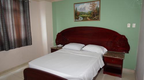 Giường trong phòng chung tại Residencial El Amanecer