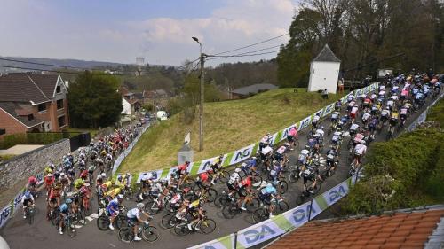 a large group of motorcyclists are lined up on a road at Résidence d'Angelo in Huy