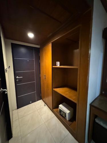 Ένα ή περισσότερα κρεβάτια σε δωμάτιο στο MrMac's Place