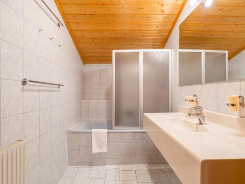 a bathroom with a sink and a shower at Chalet in Mittersill near Ski Slopes in Mittersill