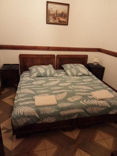 Letto o letti in una camera di Dworek Krasickiego