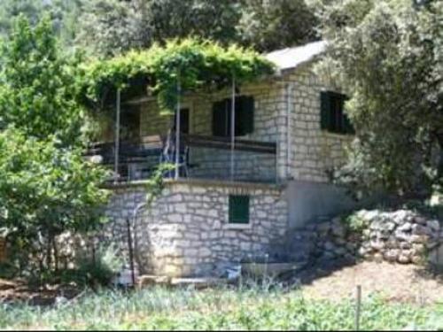 Secluded house with a parking space Postira, Brac - 22203