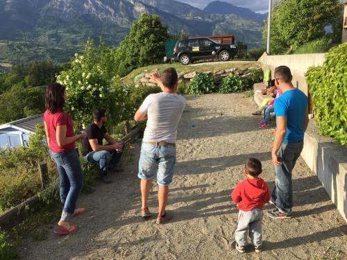 a group of people on a road with a child at "La Coustille" Chambres et Table d'Hôtes in Saint-Léger-les-Mélèzes