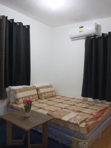 Кровать или кровати в номере Cozy Corner - Pagadian Staycation