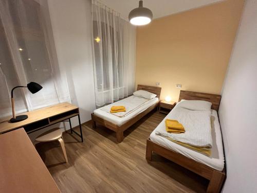 Ferienwohnungen Landeskrone Dresden tesisinde bir odada yatak veya yataklar