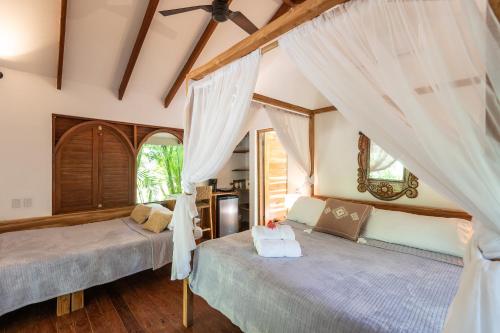 Ένα ή περισσότερα κρεβάτια σε δωμάτιο στο Villas Almendros