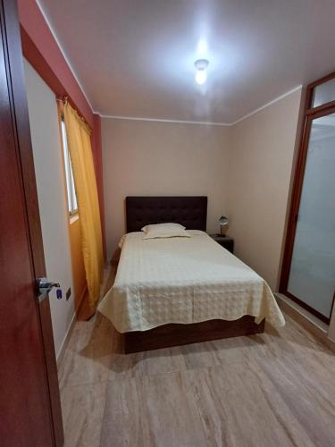 Ein Bett oder Betten in einem Zimmer der Unterkunft Cardos hostal