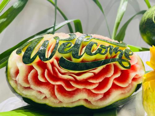 a watermelon with the word melon written on it at Ocean Pearl Hotel Phu Quoc in Phu Quoc