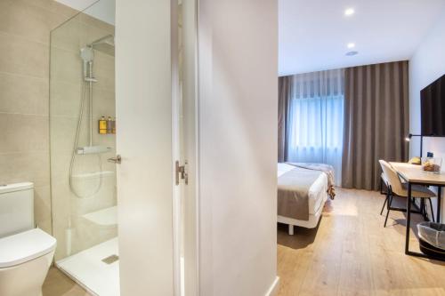 Ein Badezimmer in der Unterkunft Hotel Costabella