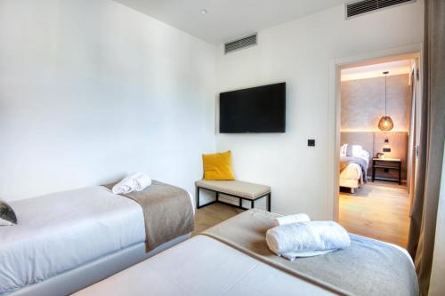 Ein Bett oder Betten in einem Zimmer der Unterkunft Hotel Costabella