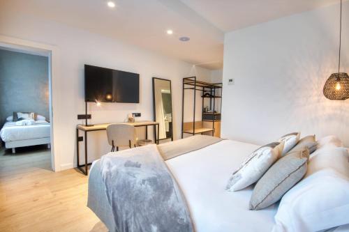 Ein Bett oder Betten in einem Zimmer der Unterkunft Hotel Costabella