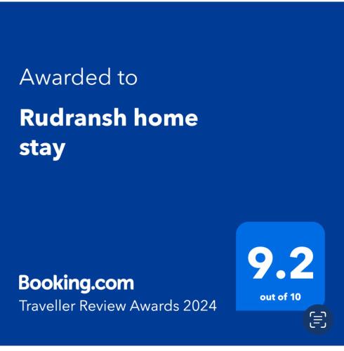 a screenshot of a phone with the text awarded to rutherford home stay at Rudransh home stay in Rishīkesh
