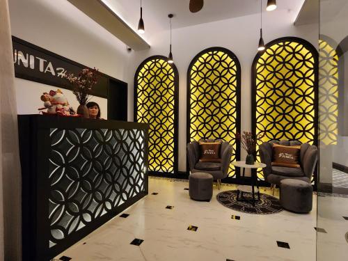 Ruang duduk di Punita Hotel