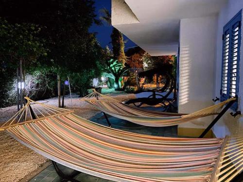 Suite House L'Isola Che Non C'èにある庭