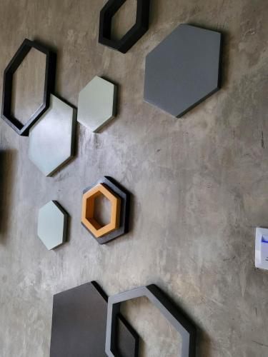 an overhead view of a wall with black and white objects at Ramos Hello Stay Cebu in Cebu City